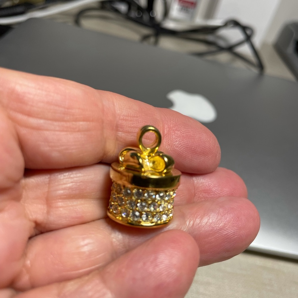 Small Goldtone Reinstone gift box by Joan Rivers